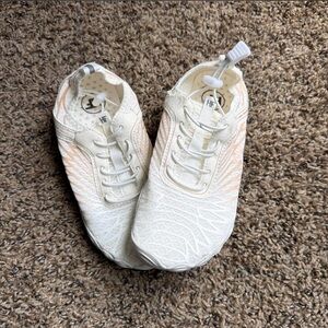 White and Orange Athletic Shoes